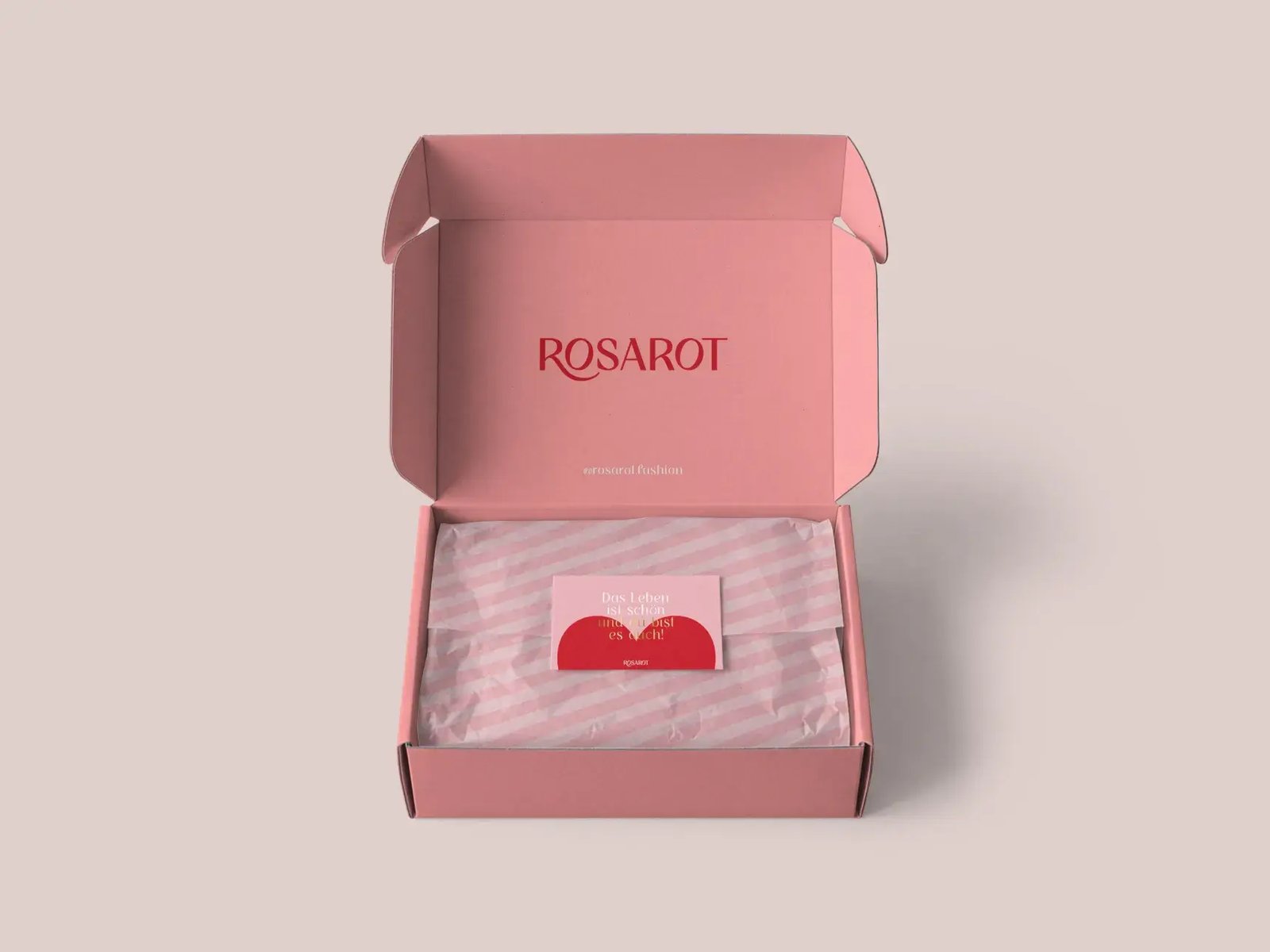 Rosa Versandbox von Rosarot mit Logo, Seidenpapier und Grußkarte
